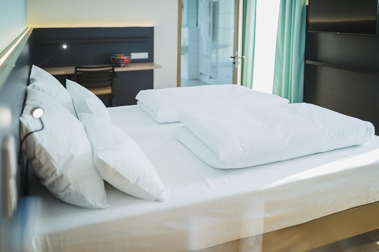 Hotel U7 เมทซิงเงน ภายนอก รูปภาพ